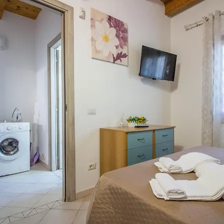 Guesthost - I Ginepri Όλμπια